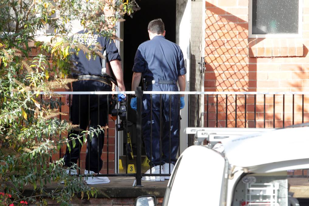 Police found blood, bone and teeth fragments, and flesh inside Dawson's Holmwood Cross Unit following the shooting in the early hours of May 2 last year. 