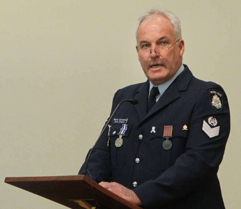 SERVICE: Senior Sergeant Garry Corcoran, pictured at a National Police Remembrance Day service in 2013, will be farewelled with a livestreamed funeral service conducted by Lester and Son on Friday morning. 