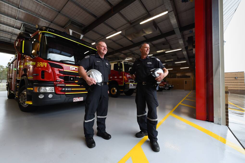 NEW AND IMPROVED: Firefighters Andrew Schulz and Ash Mills at the new station on Thomas Mitchell Drive in Wodonga ahead of Saturday's open day. The new facility cost about $8 million to construct. Picture: MARK JESSER