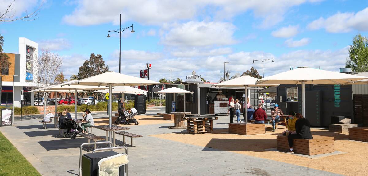GATHERING: People congregating at Wodonga's Junction Place on Tuesday. Picture: JAMES WILTSHIRE