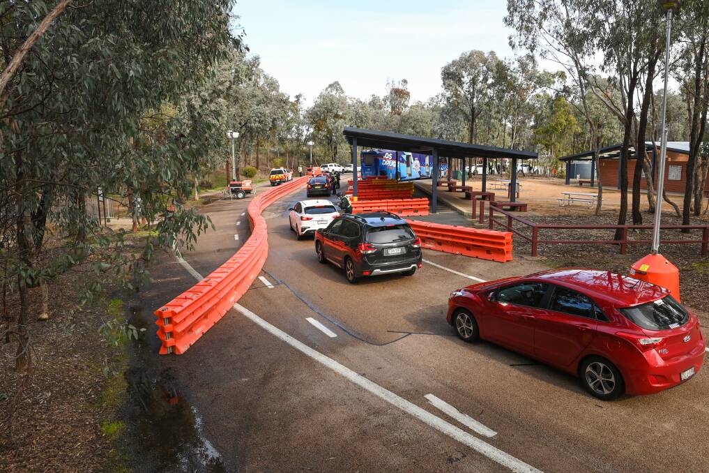 ROADBLOCK: Vehicles began being diverted from the Hume Freeway into a rest area at Chiltern on Friday morning as part of a police operation. Picture: MARK JESSER