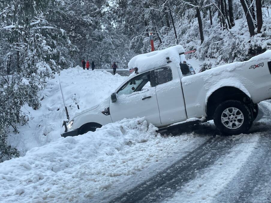 CRASHED: A four-wheel-drive which slid out of control at Falls Creek on Monday afternoon. Picture: MARK JESSER