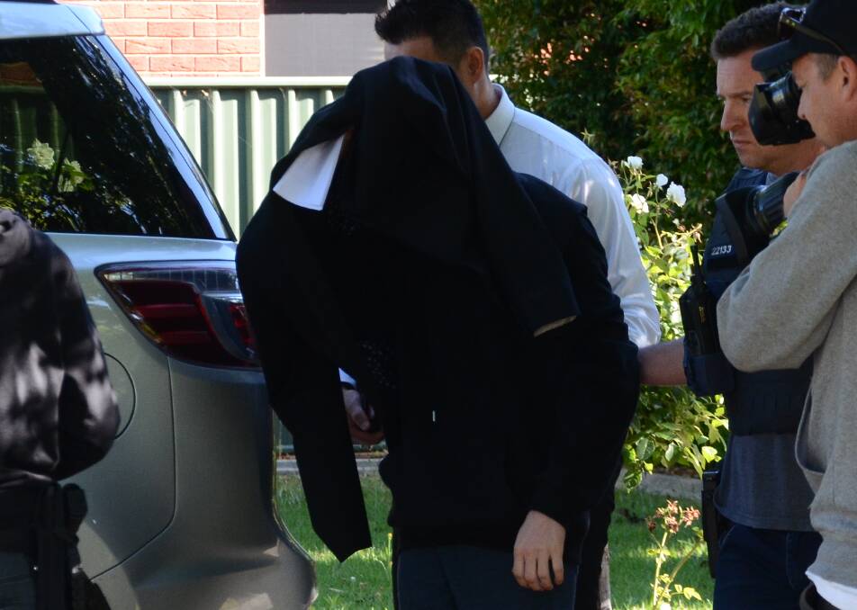 ARREST: Tyler Jakovac has been in custody since being arrested at his East Albury home by state and federal police four months ago. He faces two charges. 