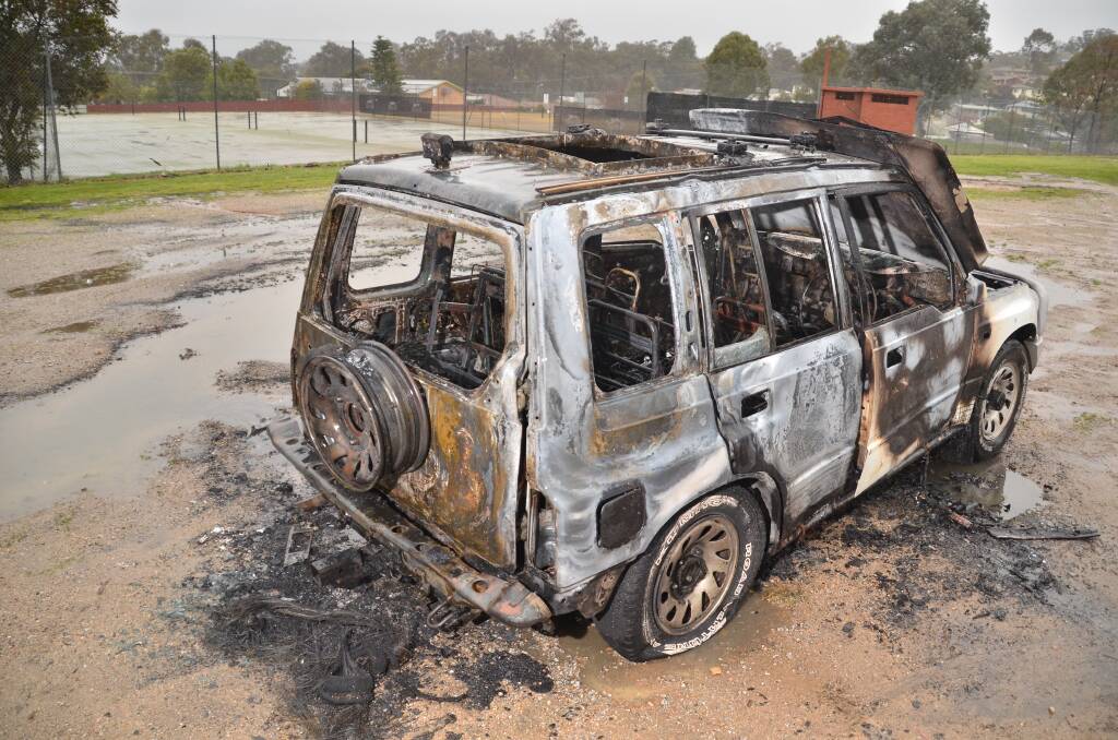 GUTTED: The torched four-wheel-drive at Glen Park on Thursday morning. Pictures: BLAIR THOMSON