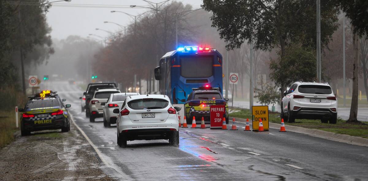 CHECKS: Police out in force on the Murray Valley Highway on Sunday. Picture: JAMES WILTSHIRE