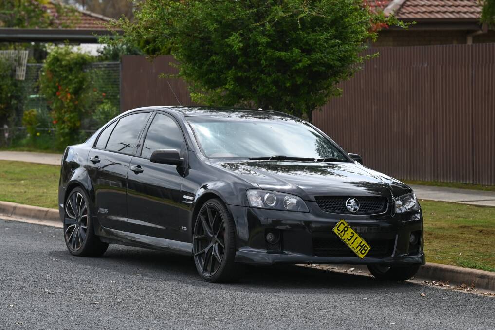 DRIVING OFFENCES: Lloyd also got behind the wheel of this black Holden multiple times despite being banned. 