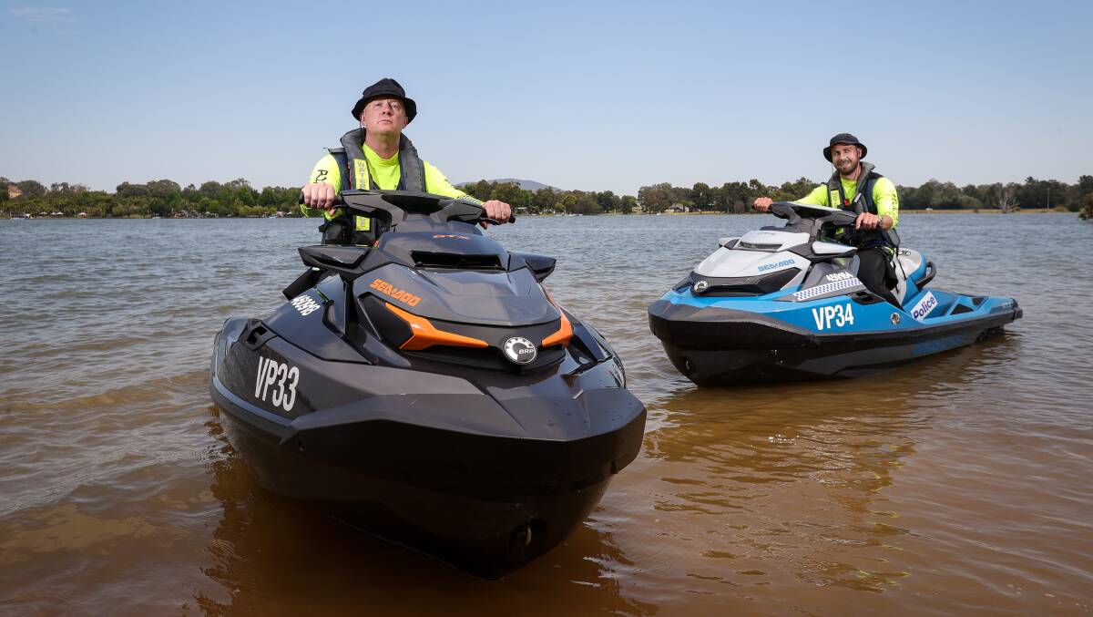 Senior Sergeant Paul Gatty and Senior Constable Jake Cooper on Lake Hume at the weekend, where 73 fines were issued. Pictures by James Wiltshire