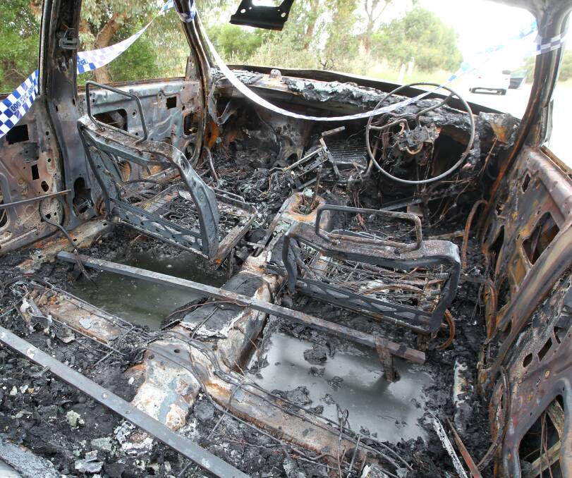 GUTTED: The torched interior of a Holden VP Commodore, which was burnt out in Lewington Street, Wodonga. Picture: BLAIR THOMSON