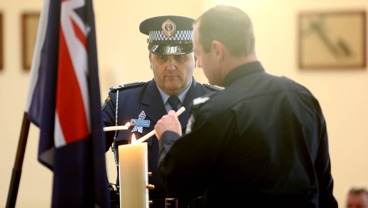 A candle was lit in memory of those who have died in the line of duty, with wreaths also laid at the ceremony. 