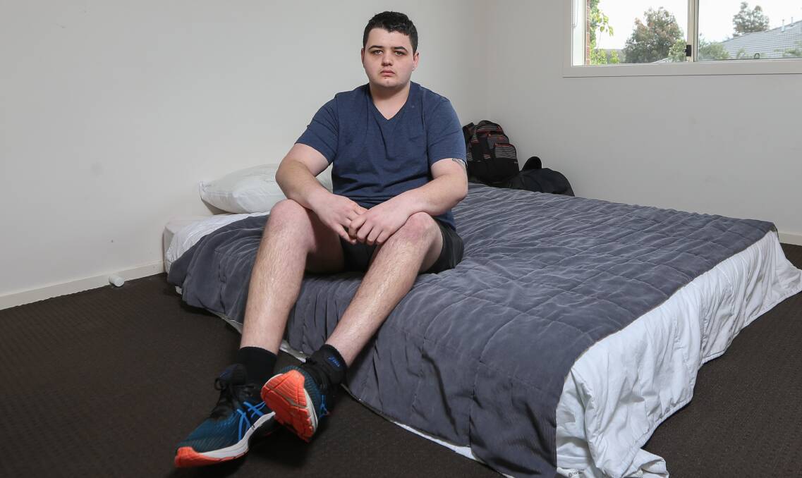 STUCK: Kurtis Somerfield, 19, has been forced to live on a mattress in his mother's home in Glenroy after struggling to get permission in recent months to move to Queensland for his new retail job. Picture: TARA TREWHELLA 