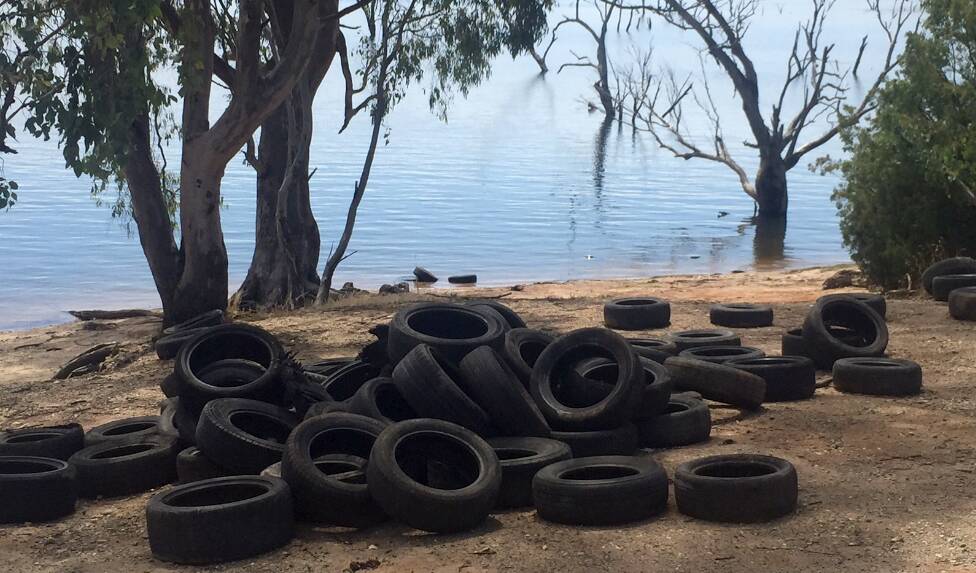 DUMPED: The Environment Protection Agency is investigating after 100 tyres were dumped at Lake Hume last weekend. 