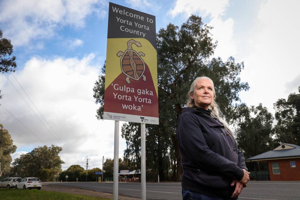 INCORRECT: Roxanne Bodsworth, pictured with one of the Yorta Yorta signs at Everton, says the Bpangerang should be recognised as the traditional owners. She has launched a petition calling for change. Picture: JAMES WILTSHIRE