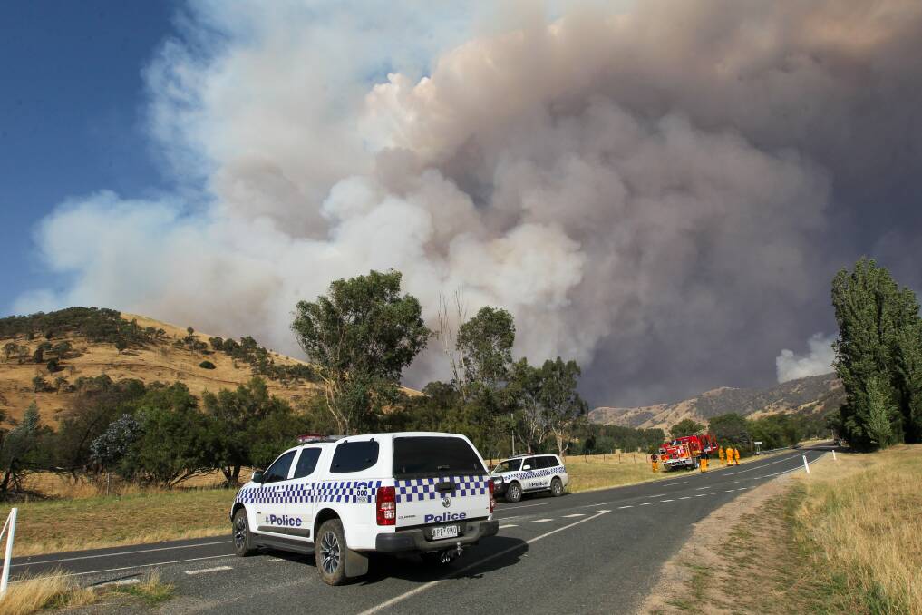 START: Smoke pictured billowing in the Walwa region as fire began to take hold in the area on December 30. 