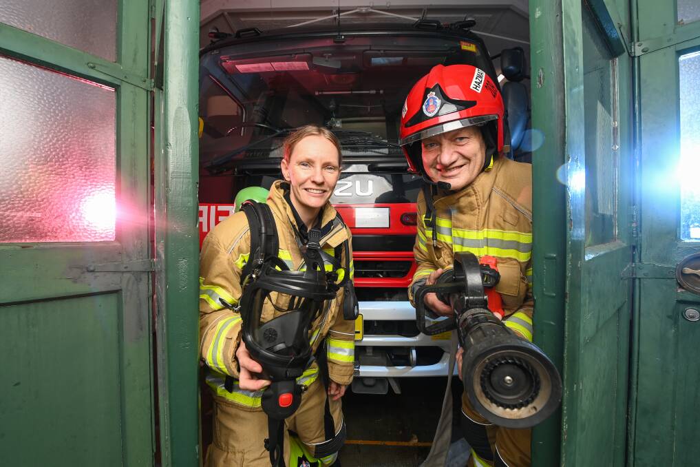 OPEN: Albury Civic firefighter Emily Trestrail and captain John Vandeven at the Kiewa Street station, which will host an open day from 10am. Other brigades in the area will also open to the public. Picture: MARK JESSER
