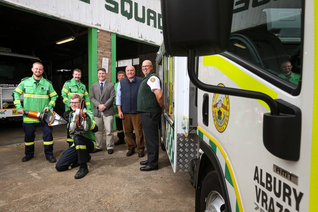 SUPPORT: Squad members were joined by Member for Albury Justin Clancy and Minister David Elliott at the handover. Picture: JAMES WILTSHIRE
