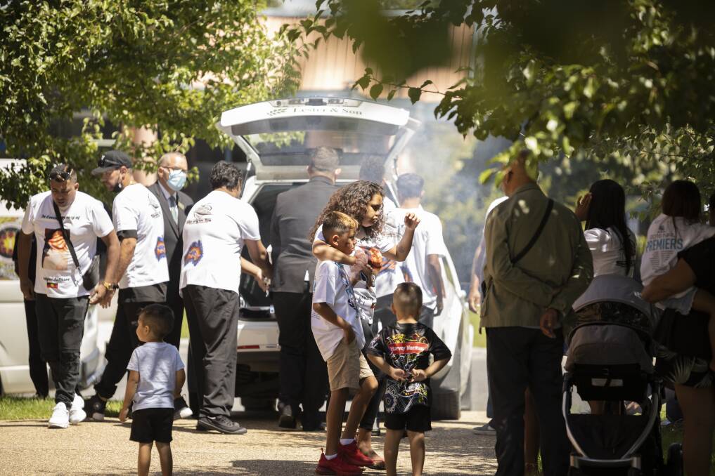 SERVICE: A smoking ceremony was held outside the church for Mr Johnson on Friday. Picture: ASH SMITH