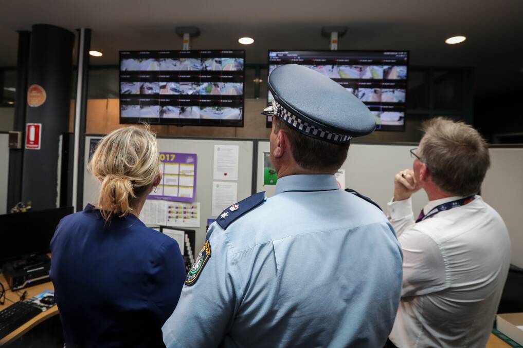 MONITORING: Member for Farrer Sussan Ley, Superintendent Evan Quarmby and Albury mayor Kevin Mack look over the security camera system during its launch last December. 