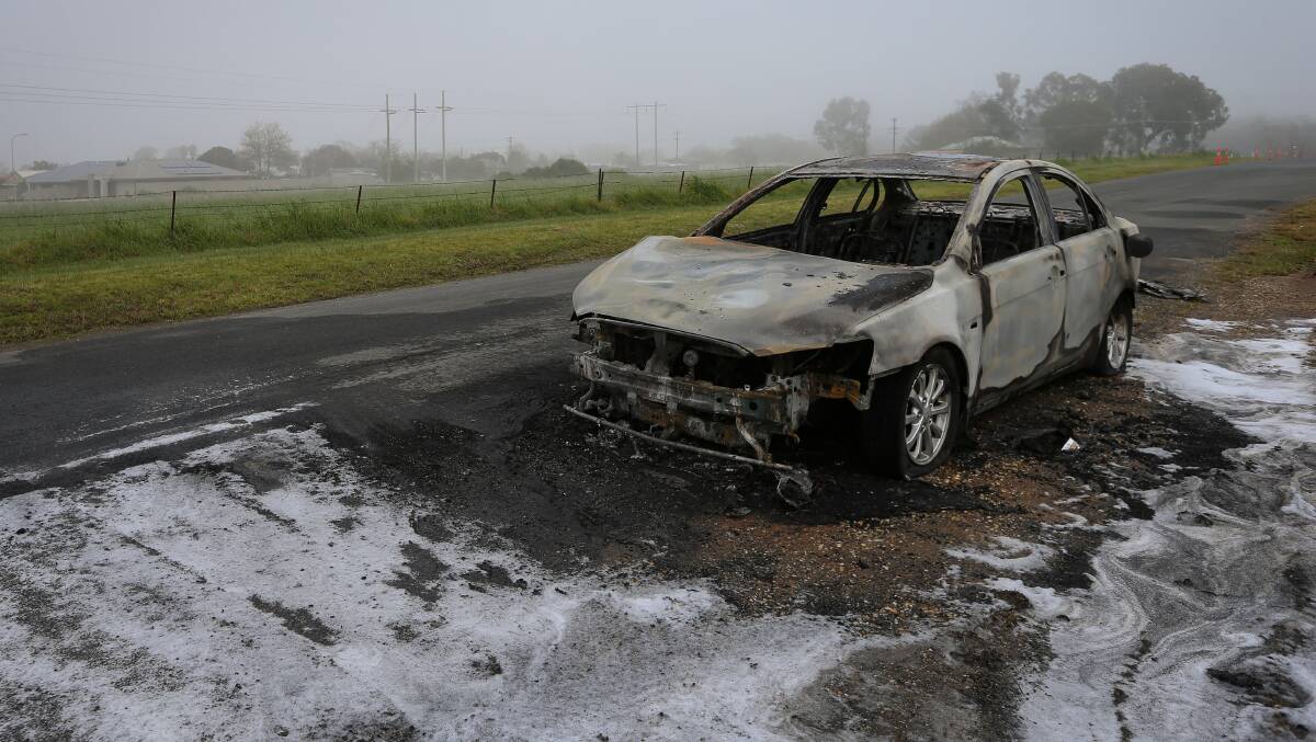 GUTTED: The shell of a sedan on the side of Strauss Street on Wednesday. It follows fires in Glenroy and North Albury in the past seven days, and a string of other car fires in the region in recent months. Picture: JAMES WILTSHIRE