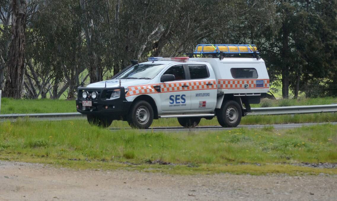 An SES crew in the Tallangatta Valley on Monday as part of the search for the crashed aircraft. Picture by Blair Thomson