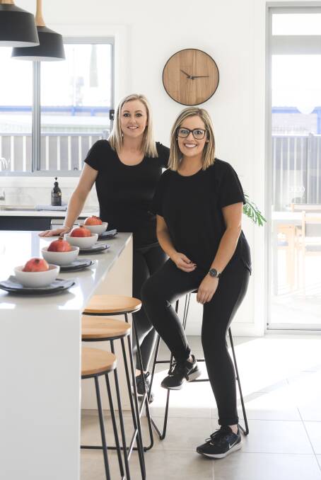 GROWING: Hayley Foots and Amy Milton of The Inspired Space. The company decks out homes with furniture in a bid to increase sale prices for owners. Picture: DEVLIN AZZI