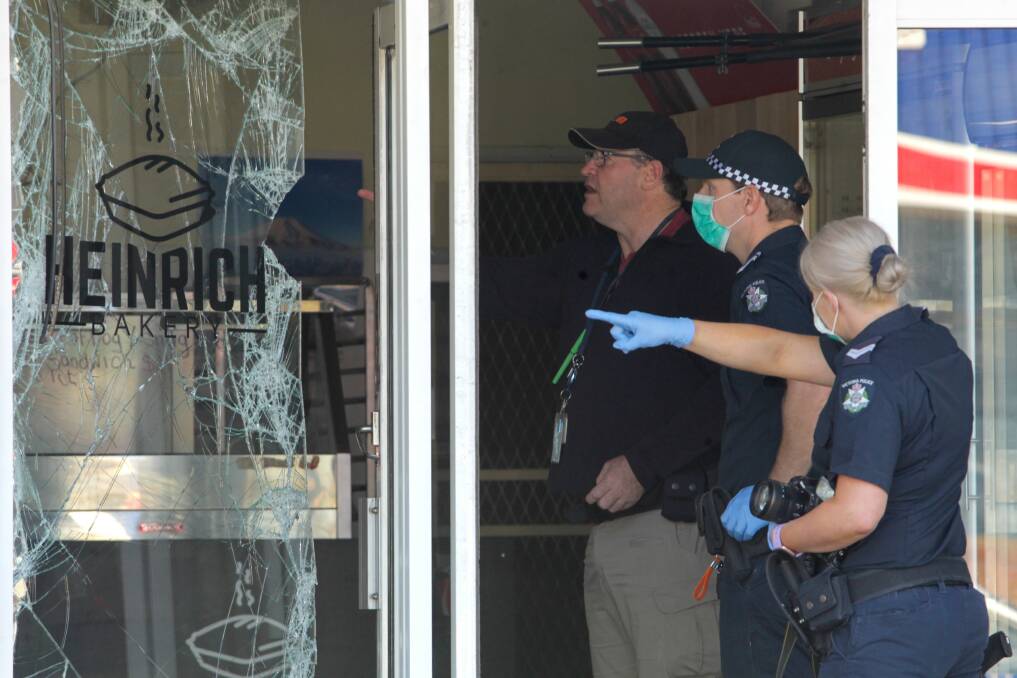 CRIME SCENE: Police attended the Mint Street business following the suspicious fire. Damage could be seen at the property, which was ransacked. Picture: BLAIR THOMSON