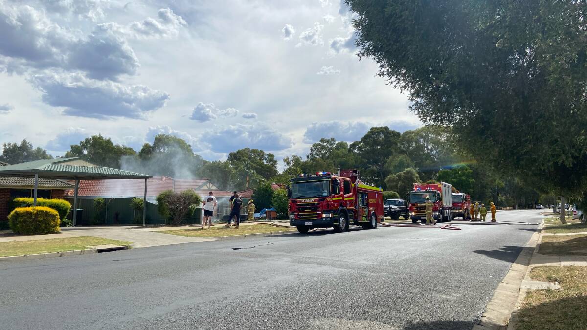 ON SCENE: Police and firefighters attended the home on Monday. Picture: SHANA MORGAN
