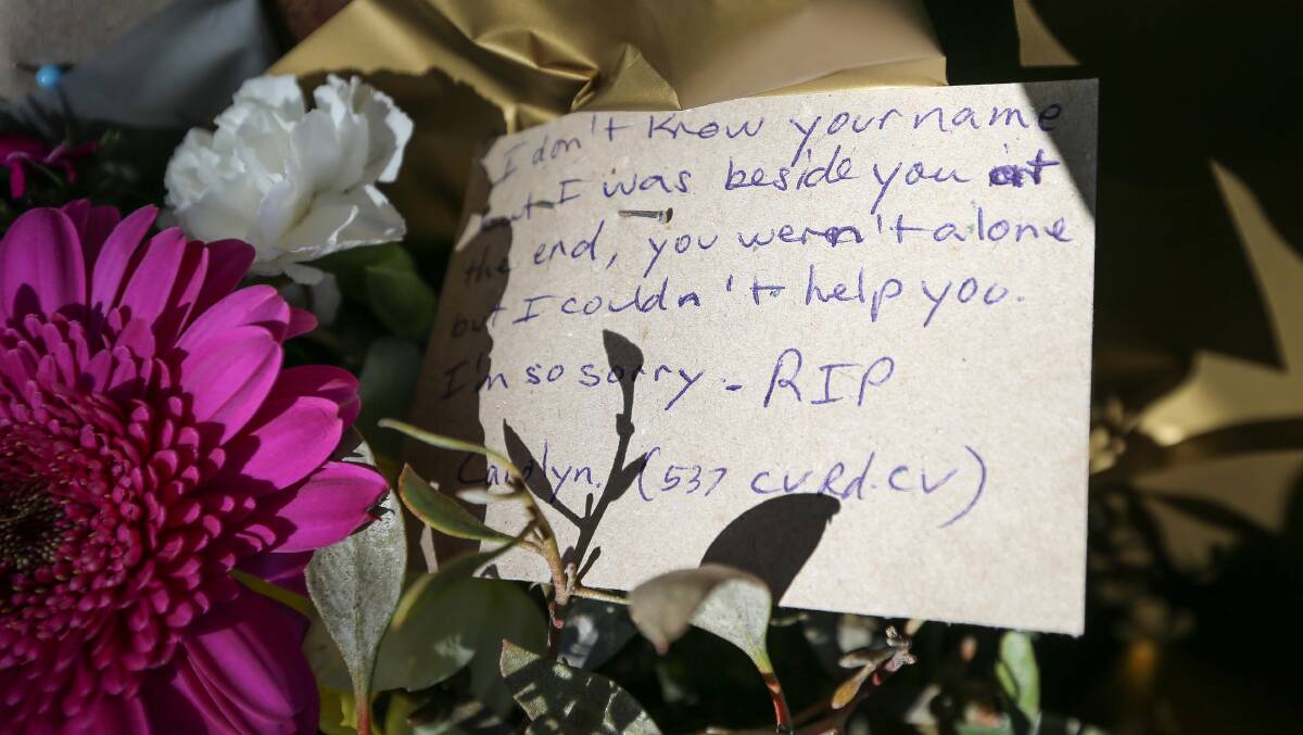 TRIBUTE: Carolyn Young's message to the late man, left at the scene of the collision. 