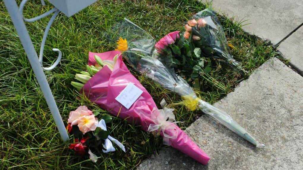 TRIBUTE: Flowers left after the tragedy.