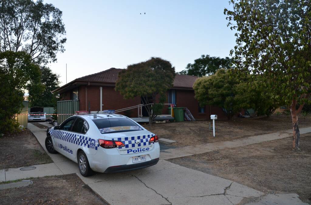 ON SCENE: Police at the Marshall Street home on Wednesday morning. Picture: BLAIR THOMSON