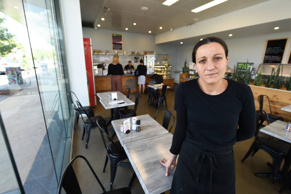 ANGER AND ABUSE: Corner Cafe Co manager Aranka Kermeci at the Wodonga business, which was the scene of a violent outburst by a customer on Sunday. The incident forced the early closure of the cafe. Picture: MARK JESSER