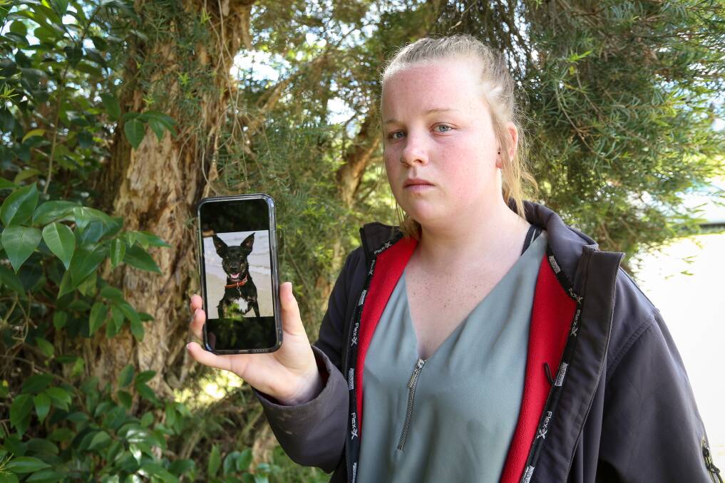 DEVASTATED: Rhiannon Symons holds up an image of Ezra. 