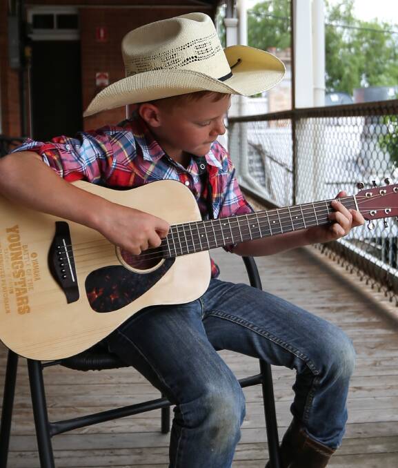 PERFORMER: Jesse O'Brien, 10, is a finalist in the Aussie Bush Idol. He's one of six musicians vying for a place in the grand final at the Culcairn Hotel. Organisers say the number of attendees has been positive. Picture: JAMES WILTSHIRE