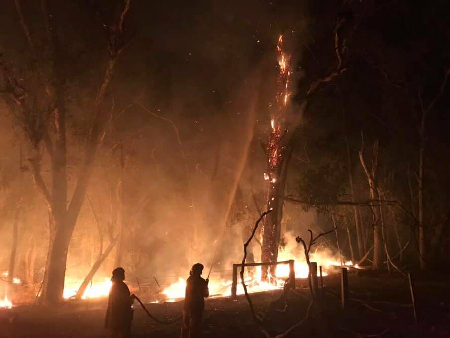 FIERCE FIRE: Firefighters battle the blaze on Wednesday night. Picture: TARRAWINGEE FIRE BRIGADE