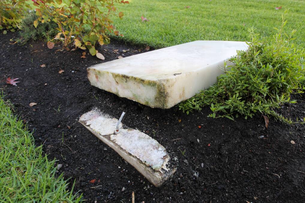 SNAPPED: The headstones broke at the base. 