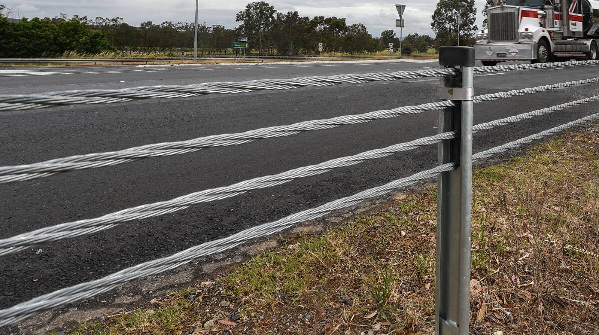 SAVED: Wire rope barriers on the side of the Hume Freeway. 