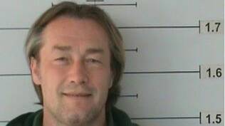 WANTED: Members of the public are urged not to approach prison escapee Artur Wojcik, 45, who is serving time near Holbrook for cocaine importation. 