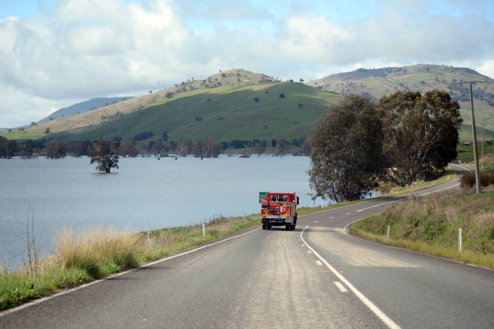 A CFA crew in the Tallangatta Valley on Monday morning. Picture by Blair Thomson