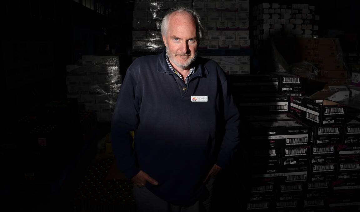 LEFT IN DARK: More people are having their power cut and are seeking help, says Albury Wodonga Foodshare regional manager Peter Matthews. Picture: BLAIR THOMSON