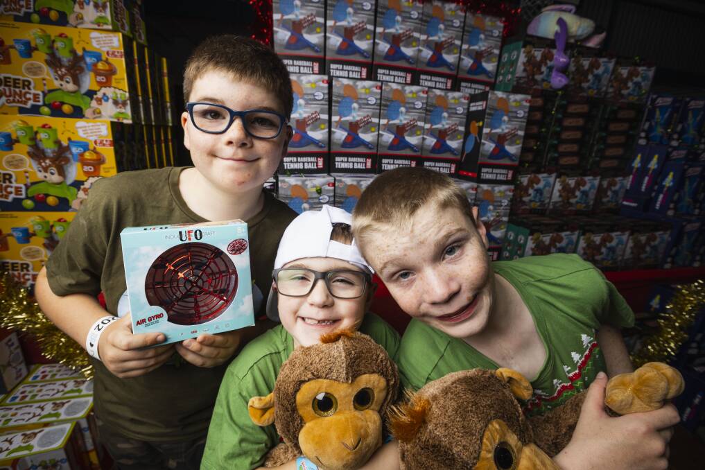 Brothers Patrick, 10, Jaxson, 7, and Max Pini, 14, in the toy room. Picture by Ash Smith