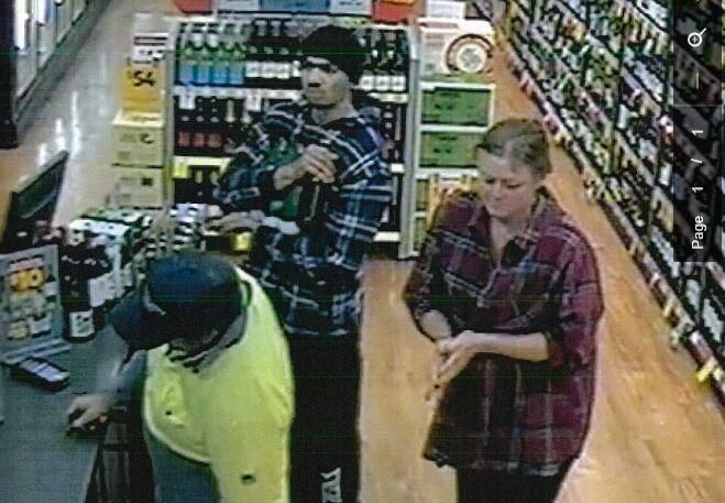 HELP SOUGHT: Police want to identify these people in check shirts after a theft on June 23
