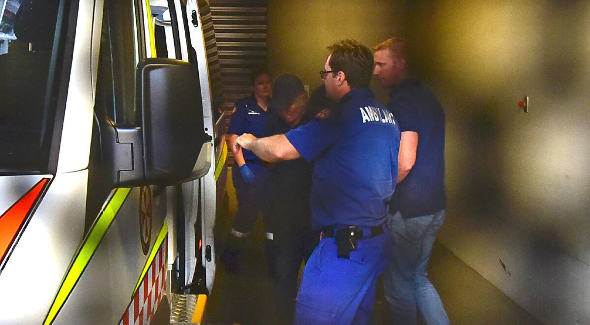 CAPTURED: Gino Stocco is taken away from the Dubbo police station in an ambulance following his arrest in October. Picture: DAILY LIBERAL