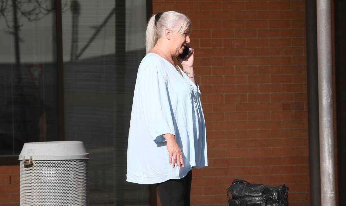 Karen Buovac outside Wodonga court on Wednesday. She was ordered to perform 150 hours of unpaid work after scamming a former family member out of his currency collection. 