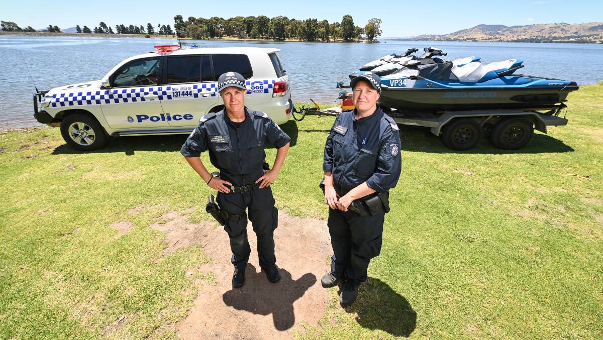 Water police officers Senior Constable Ash Fennell and Senior Constable Lauren Foley during an operation on Lake Hume in December last year. File picture 