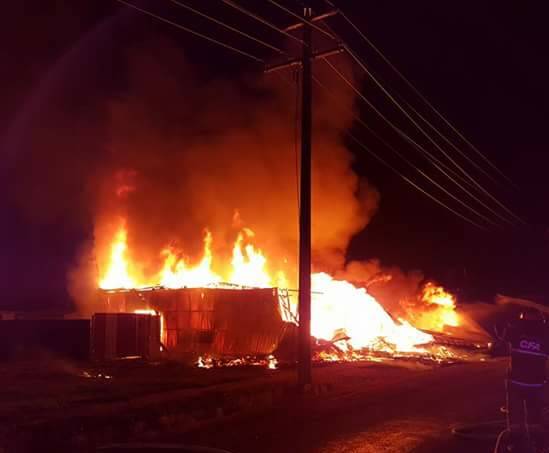 ALIGHT: Flames leap from a Benalla shed on Thursday night. Picture: BENALLA CFA
