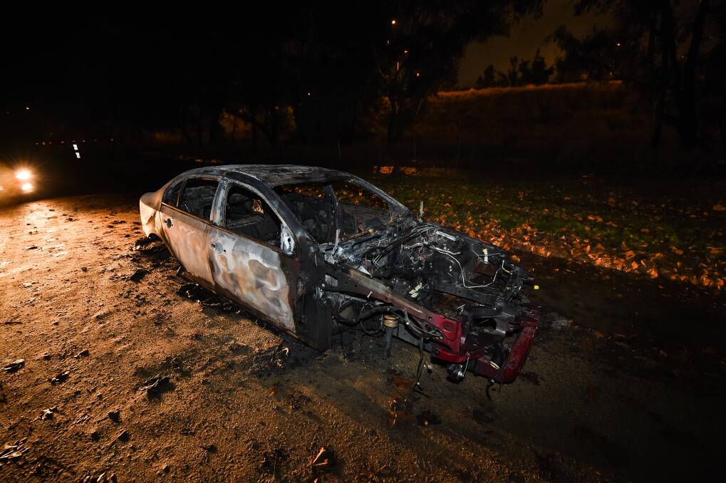 GUTTED: The burnt out vehicle. Picture: MARK JESSER
