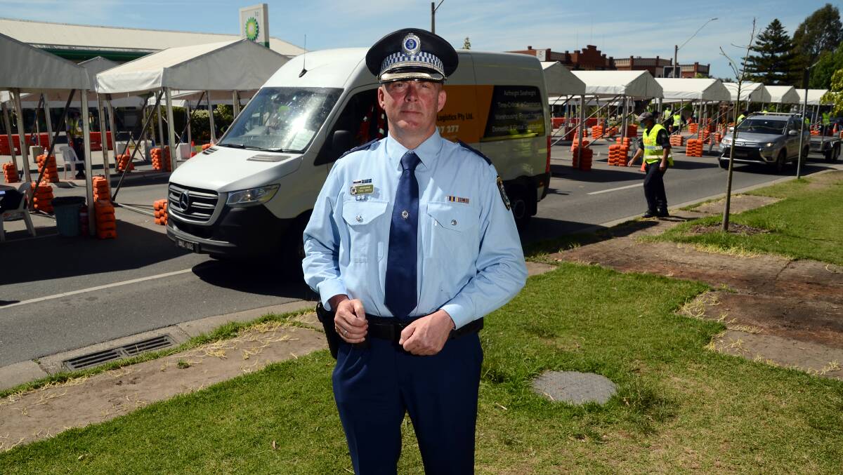 RELIEF: Superintendent Paul Smith, pictured at the Wodonga Place checkpoint on Wednesday, is looking forward to the sites being re-opened by early Monday morning. Some items have already been removed. Picture: BLAIR THOMSON