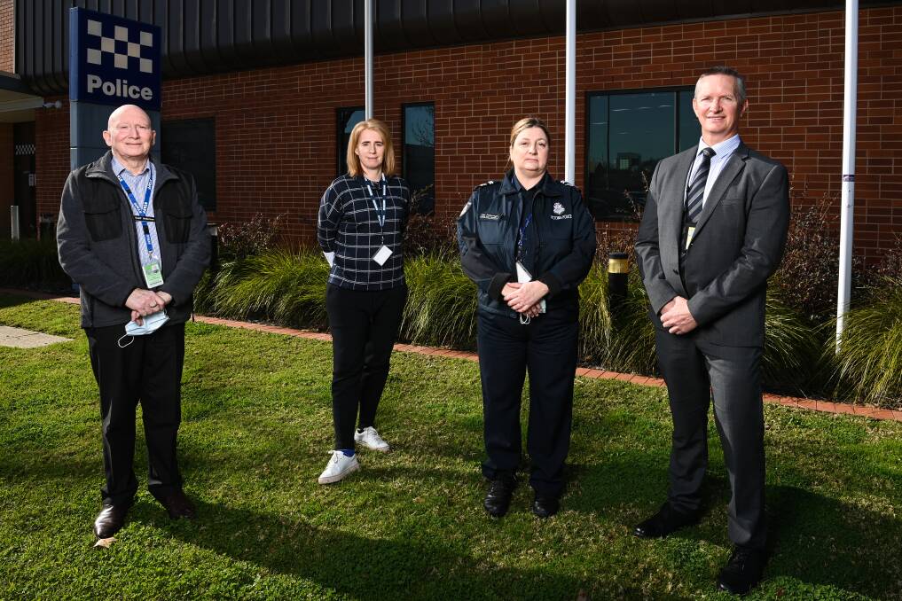 HELP: Some of Wodonga's family violence workers including Geoff Anderson, Senior Constable Kylie Clarkson, Leading Senior Constable Lynn Furborough and Detective Senior Sergeant Damien Peppler. 