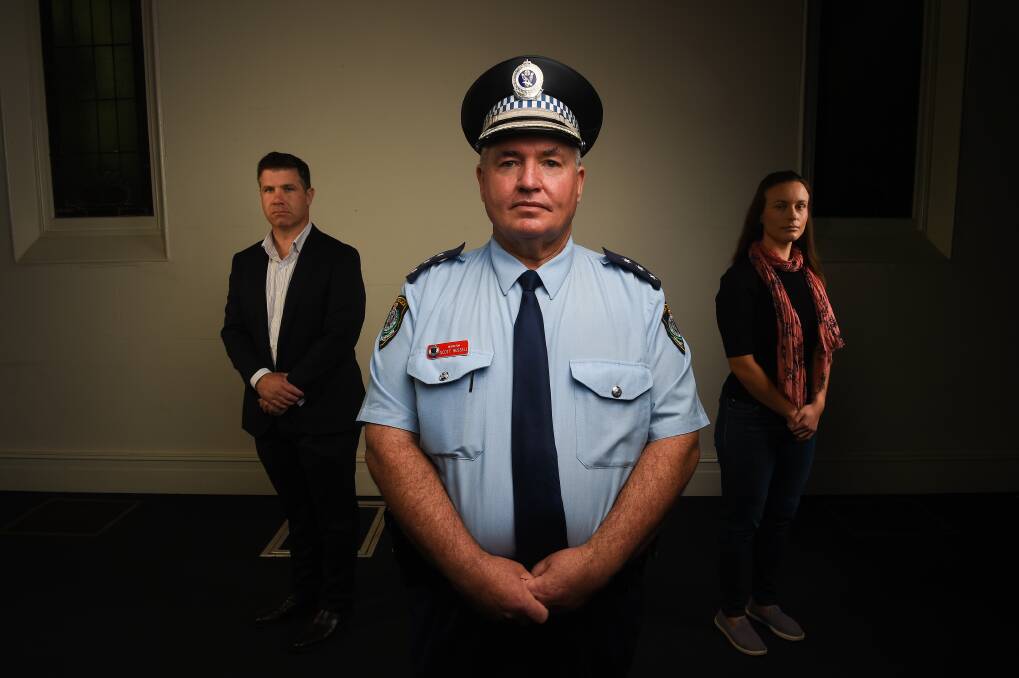 NO EXCUSE: Inspector Scott Russell, pictured with Member for Albury Justin Clancy and Border Domestic Violence Network chairwoman Amanda Cohn at yesterday's launch of domestic violence advertisements. Picture: MARK JESSER