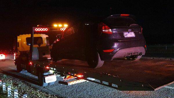 IMPOUND: Police impound a Melbourne man's car on Sunday after he was caught at 152km/h at Glenrowan. 