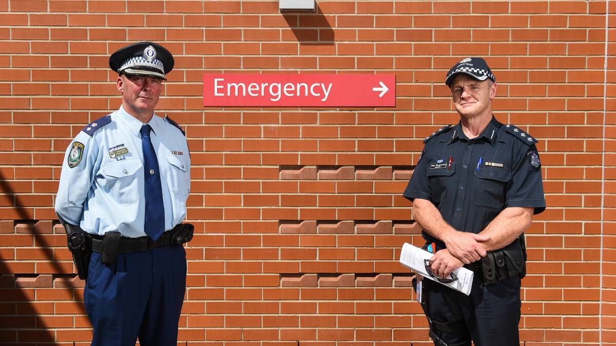 WORKING TOGETHER: Superintendent Paul Smith and Inspector Paul Hargreaves, from Albury and Wodonga, have both urged members of the public to adhere to the restrictions in place due to COVID-19. 